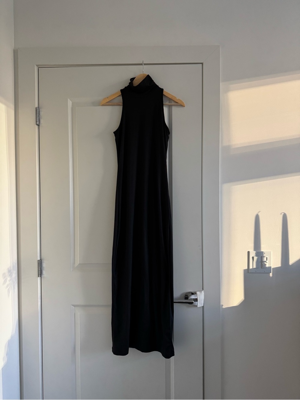 Bumpsuit Sleek Black Sleeveless Turtleneck Maxi Dress